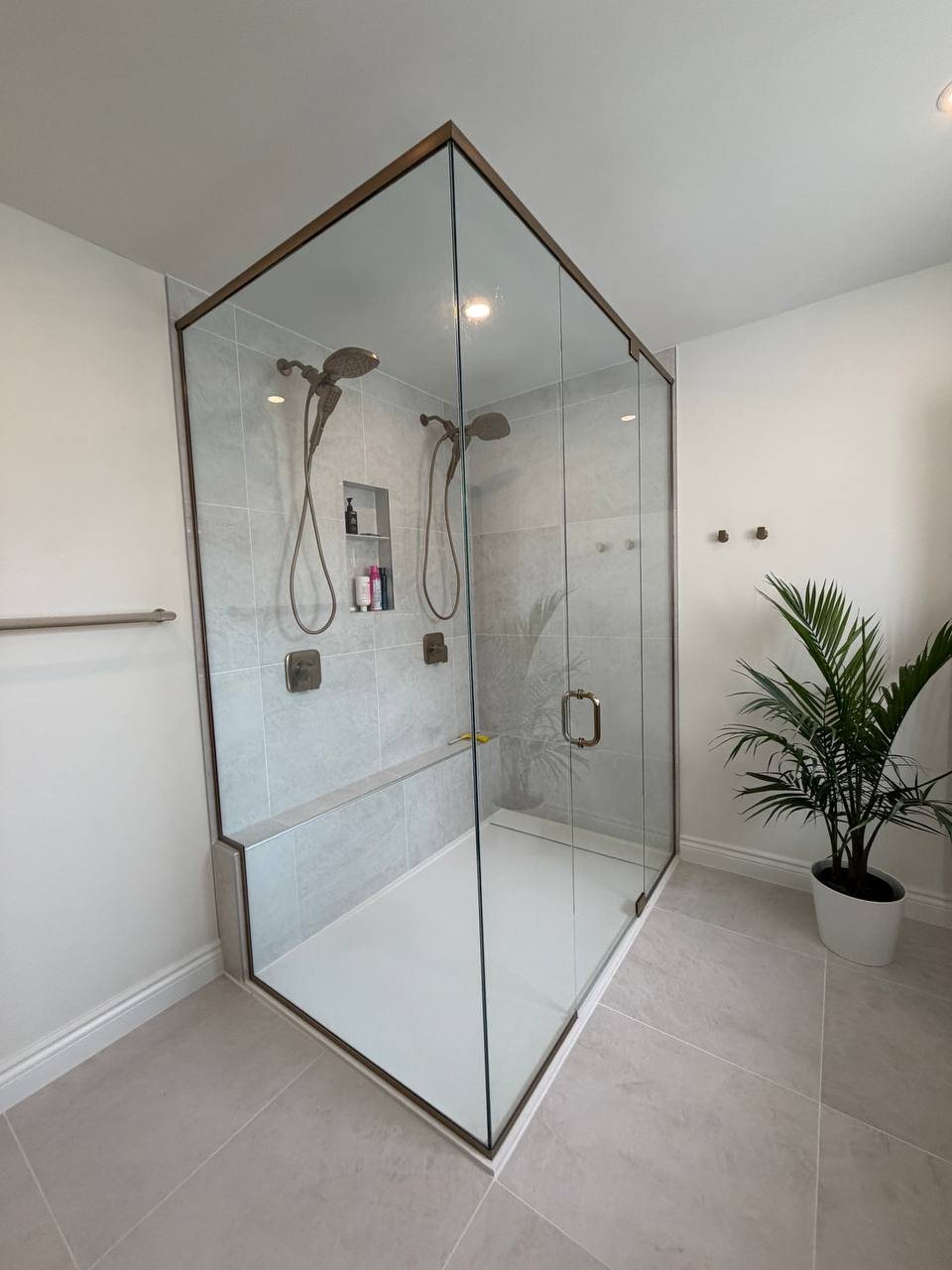 Bathroom after: frameless glass walk-in shower