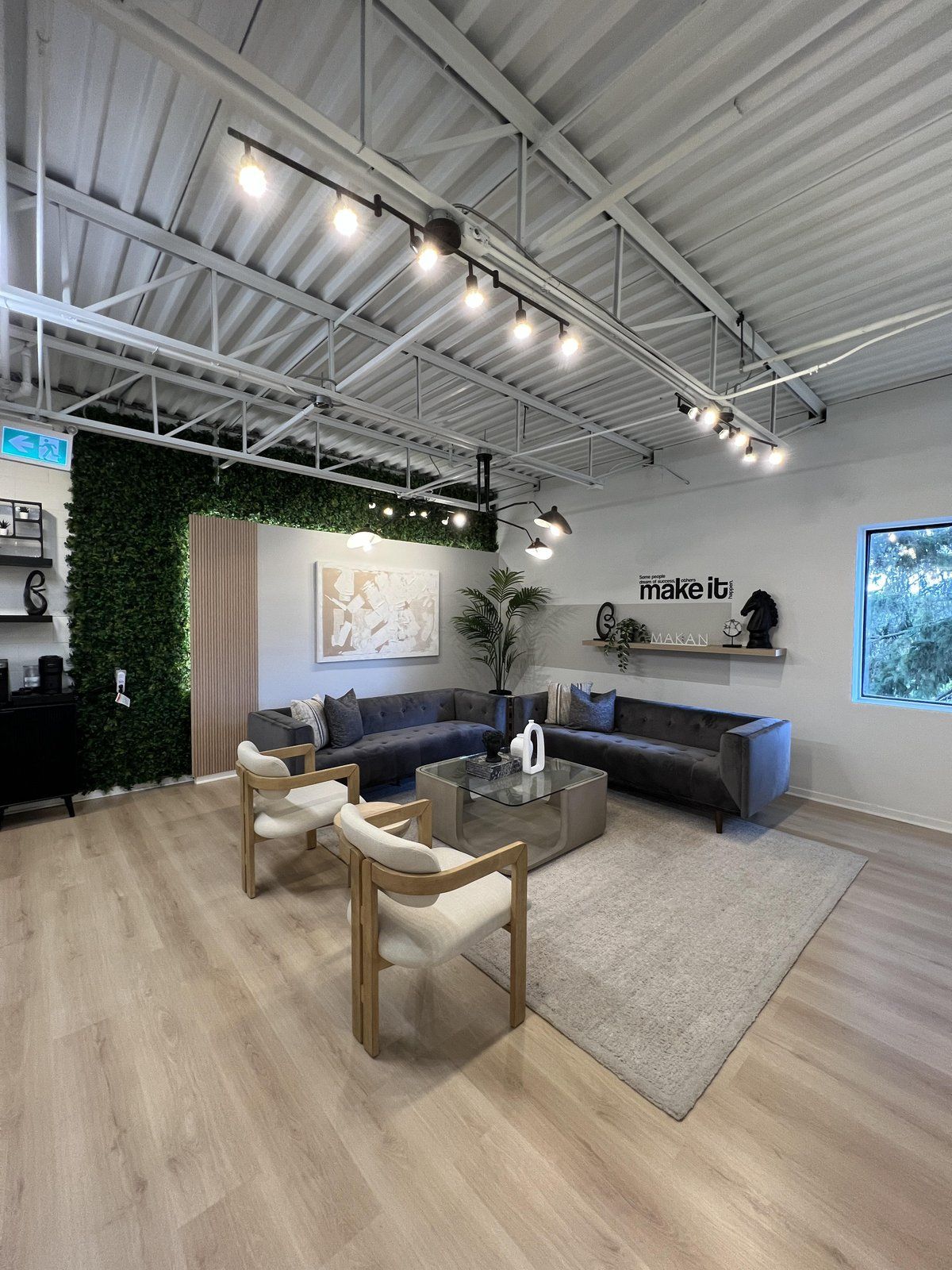 Team Makan office after: open ceiling, new floors and a lounge